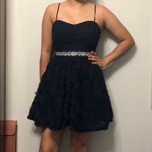 A navy sweetheart dress with straps